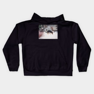 Winter snow scene with cute black and tan dog Kids Hoodie